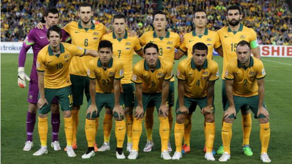 The Socceroos semi-final starting XI line up for their team shot before kick-off against UAE.