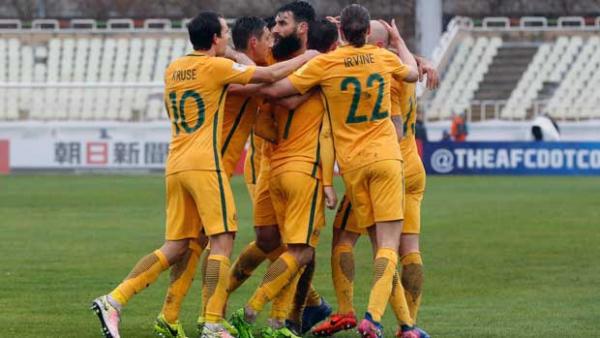 The Caltex Socceroos were forced to share the spoils against a spirited Iraq in Tehran.