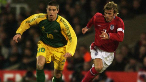 Harry Kewell darts away from David Beckham when the Socceroos last played England in 2003.