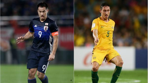 Japanese striker Shinji Okazaki and Caltex Socceroos midfielder Mark Milligan.
