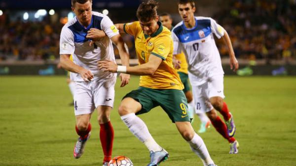 Socceroos striker Tomi Juric shields the ball against Kyrgyzstan.