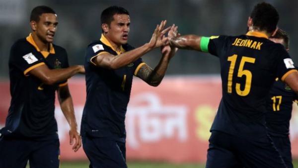 Tim Cahill and Mile Jedinak celebrate the Socceroos' opener against Bangladesh.