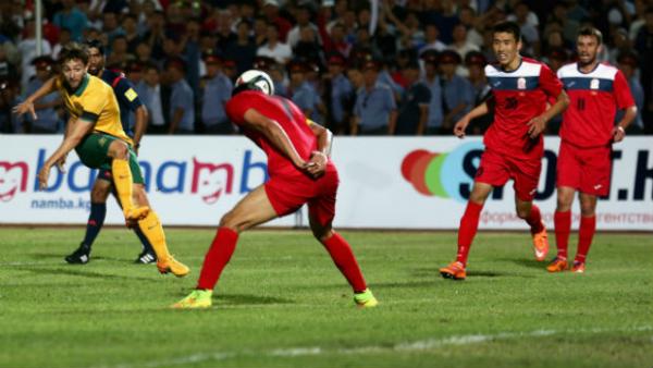 Socceroo Tommy Oar fires a shot from distance against Kyrgyzstan.
