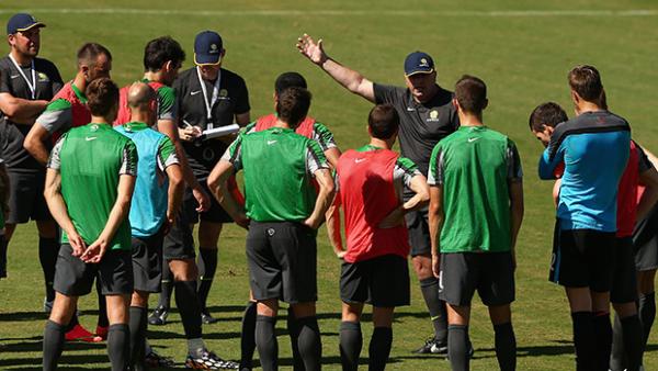 The Socceroos receive instructions from coaching staff during training in Vitoria.