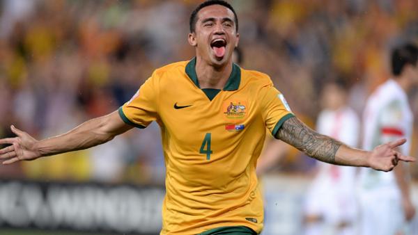 Cahill celebrates after scoring against China in Brisbane.