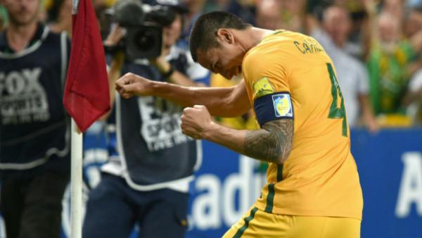 Caltex Socceroos striker Tim Cahill celebrates scoring against Jordan in a World Cup qualifier.