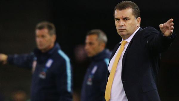 Ange Postecoglou looks on during his side's 2-1 loss to Greece.