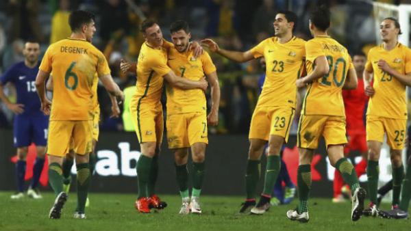 The Caltex Socceroos celebrate Mathew Leckie scoring in one of their June friendlies against Greece.