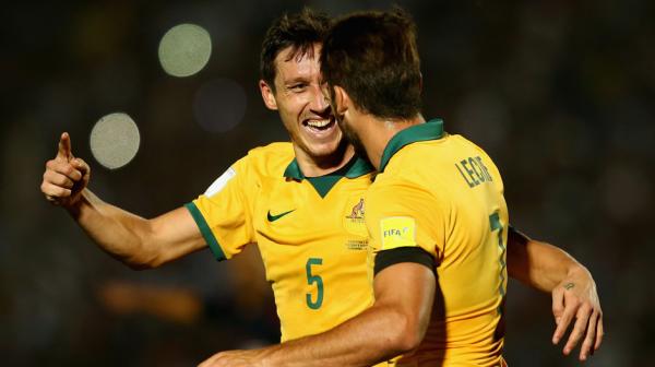 Mark Milligan celebrates scoring the Socceroos' opener against Tajikistan last month.
