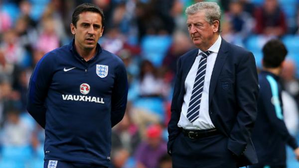 England assistant coach Gary Neville and manager Roy Hodgson.