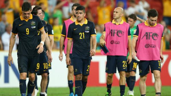 A disappointed Socceroos side depart Brisbane Stadium at full-time.