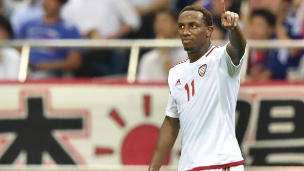 UAE star Ahmed Khalil celebrates a goal in his side's 2-1 win over Japan.