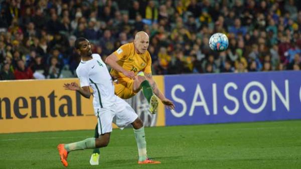 Caltex Socceroo playmaker Aaron Mooy was delighted that Australia have closed the gap at the top of their World Cup qualification group.