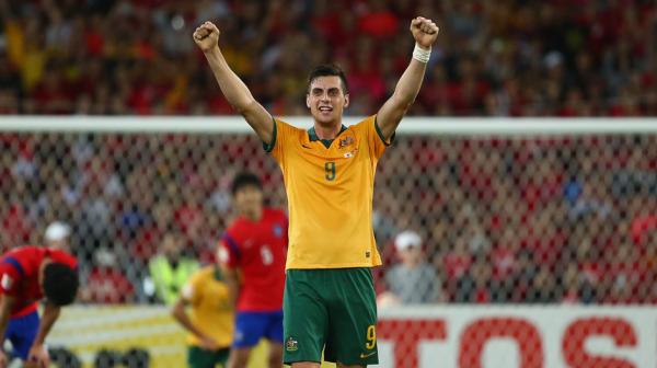 Tomi Juric celebrates the Socceroos' Asian Cup triumph over Korea Republic.