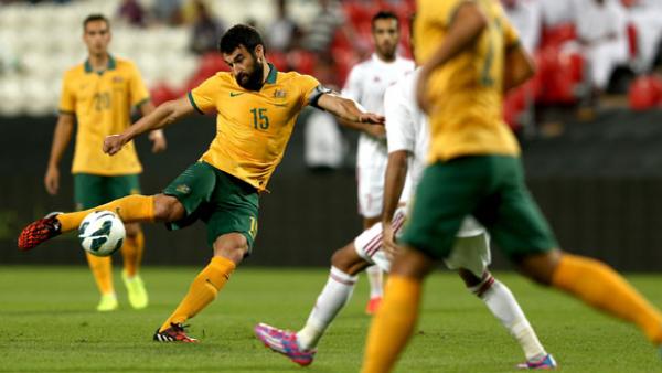 Socceroos skipper Mile Jedinak in action against UAE