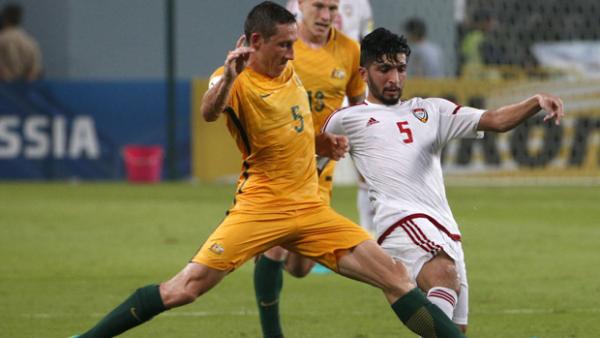 Mark Milligan fights for the ball during Australia's 1-0 win over the UAE.