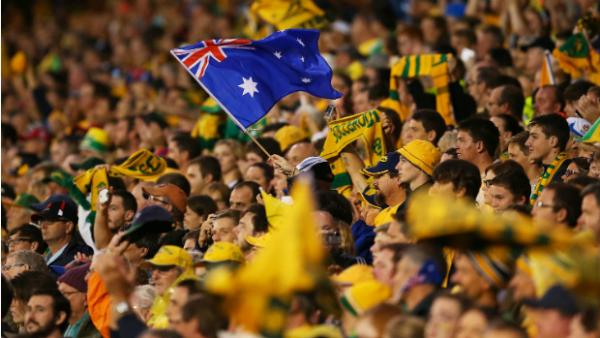 Socceroos fans show their support against UAE at Newcastle Stadium.