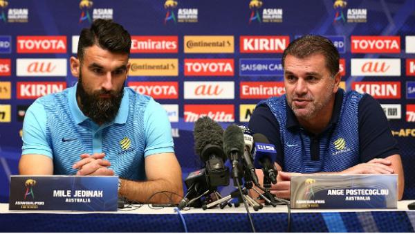 Caltex Socceroos captain Mile Jedinak and coach Ange Postecoglou at Wednesday's press conference.