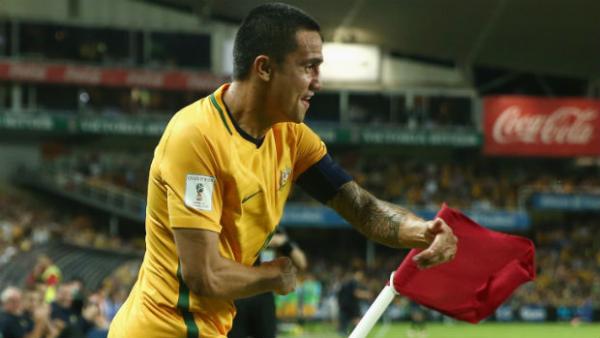 Tim Cahill performs his trademark goal celebration after scoring against Jordan on Tuesday night.