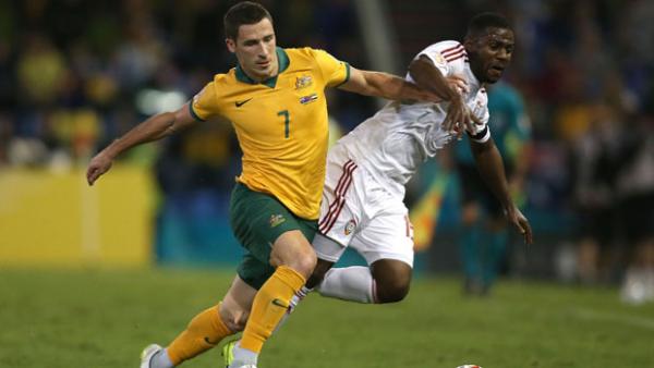 Socceroos flyer Mat Leckie challenges for the ball with UAE's Ismail Al Hammadi during the 2015 Asian Cup.